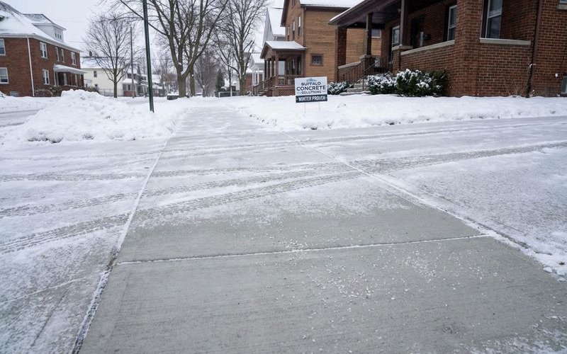Limestone slurry concrete leveling process in Buffalo NY winter climate
